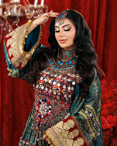 Family and friends celebrating at a colorful henna night event